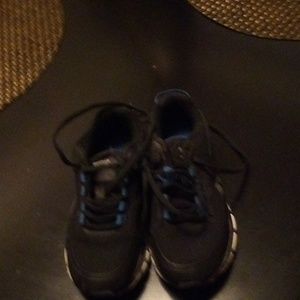 Reebok Boys Tennis shoes size 11, Blue and Black with shoestrings.